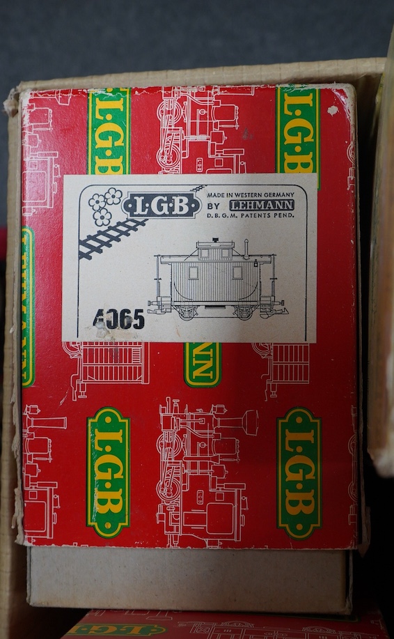 A quantity of Lehmann LGB G scale railway rolling stock, track and accessories, including; a bogie carriage, fourteen freight wagons, four trackside buildings, signals, boxed sets of points, a good selection of unboxed t